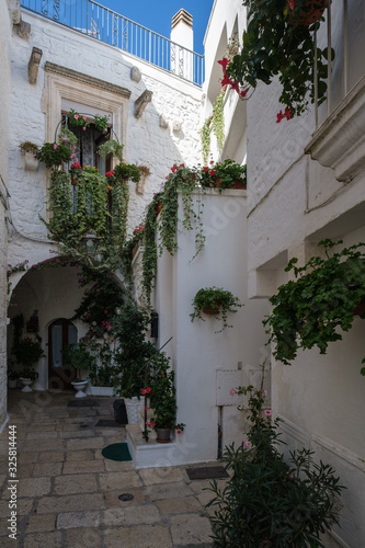 Fototapeta Naklejka Na Ścianę i Meble -  Street in Old City Centre, Cisternino, Apulia, Italy