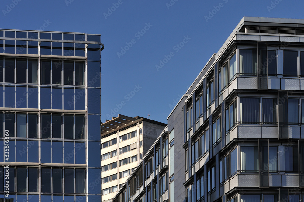 glass facades of office buildings in a city