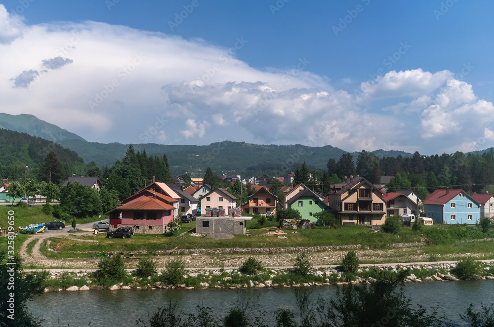 Rural landscape with mountains and houses in Zabljak Municipality, Montenegro