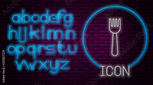Glowing neon line Disposable plastic fork icon isolated on brick wall background. Neon light alphabet. Vector Illustration