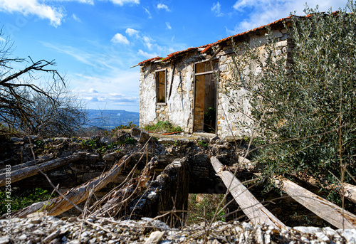 Fototapeta Exterior of derelict village house