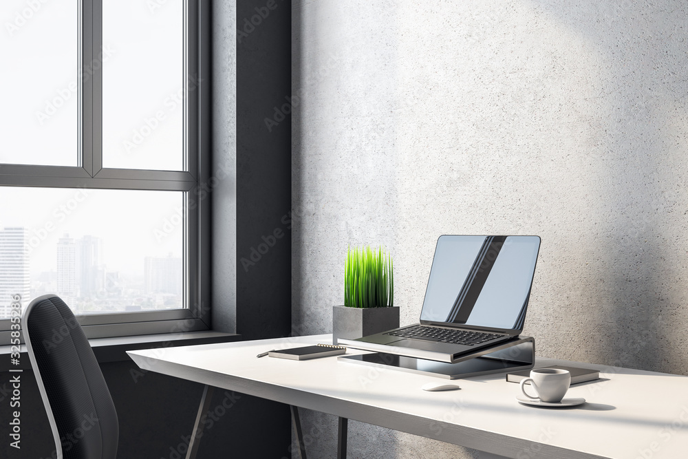 Laptop on designer workplace with blank screen Laptop on designer workplace with blank screen
