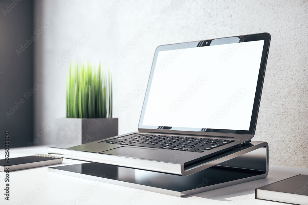 Laptop in contemporary designer workplace Laptop in contemporary designer workplace