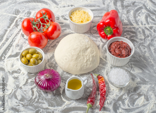 Ingredients for making neapolitan pizza. Prepare Italian pizza raw dough 