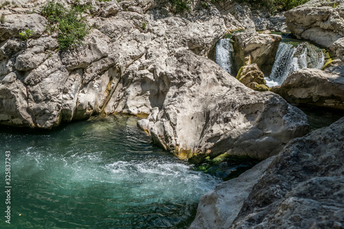 Burano River in Cagli with waterfall and clear water