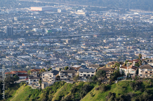Hilltop homes above Los Angeles County smog in the Verdugo Hills area of Glendale California. © trekandphoto