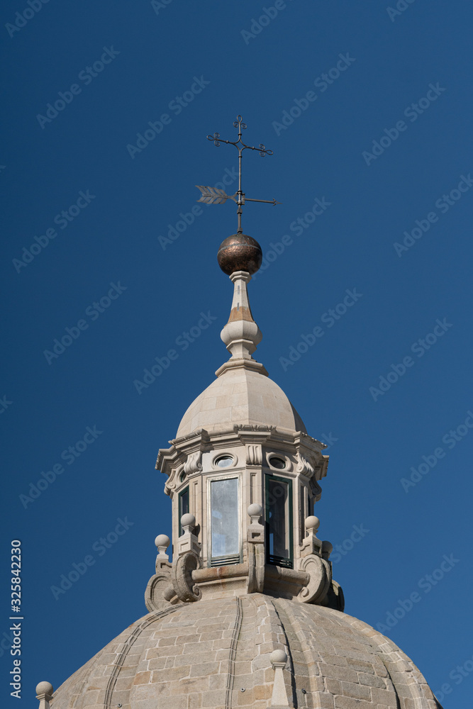 weather vane or wind vane and dome lantern on the top of a tower of santiago de Compostela Cathedral