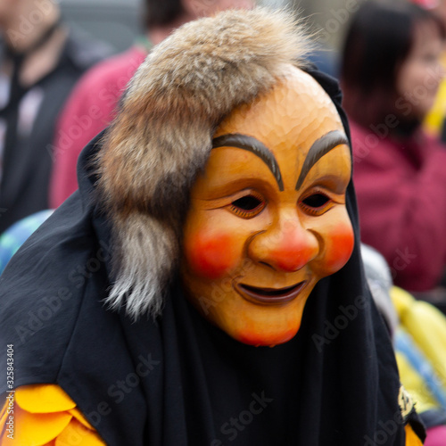 Closeup Portrait of a masked person on a carnival parade