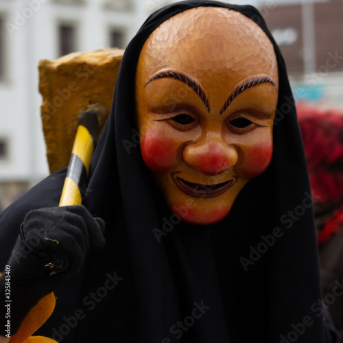 Closeup Portrait of a masked person on a carnival parade