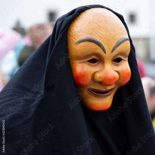 Closeup Portrait of a masked person on a carnival parade