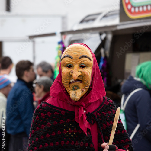 Closeup Portrait of a masked person on a carnival parade
