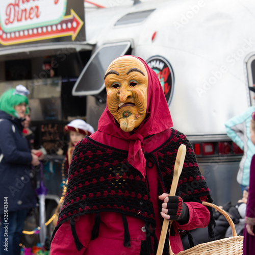 Closeup Portrait of a masked person on a carnival parade
