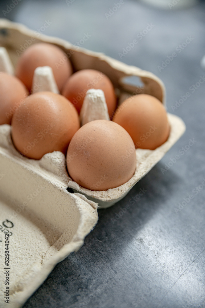 Close-up view of raw chicken eggs in egg box Close-up view of raw chicken eggs in egg box