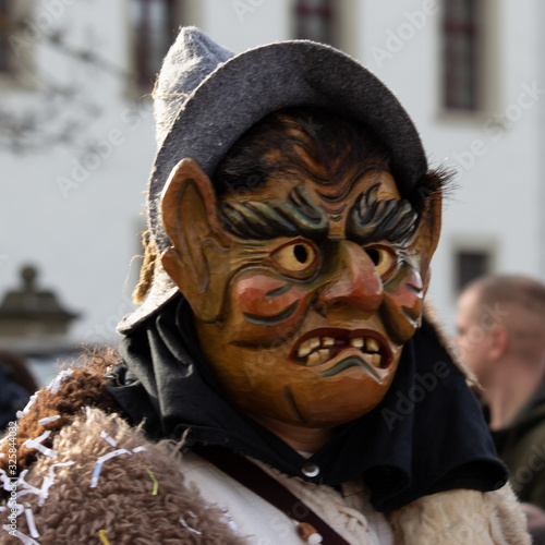 Closeup Portrait of a masked person on a carnival parade