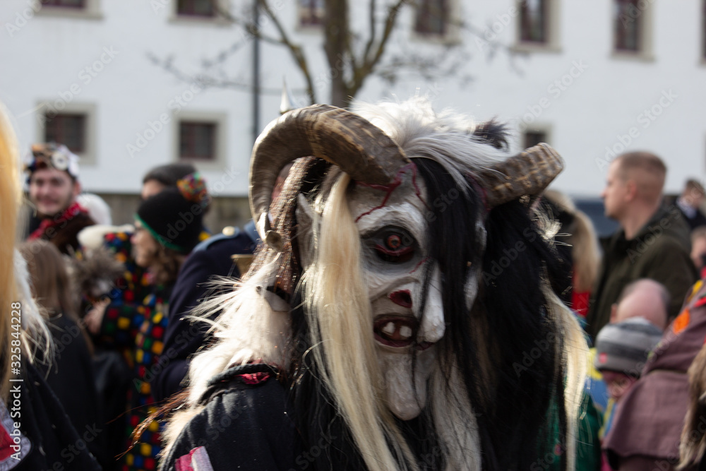 Closeup Portrait of a masked person on a carnival parade