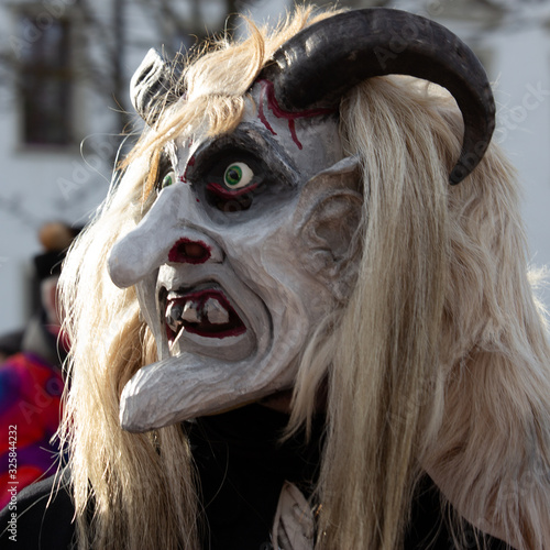 Closeup Portrait of a masked person on a carnival parade
