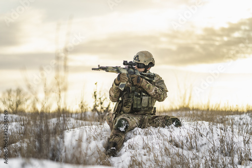 Typical Ukrainian military soldier. Equipment of the Ukrainian military army. What is the Ukrainian military. Soldier patrols terrain territory