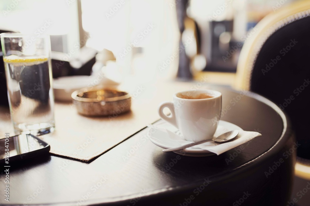 cup of coffee on the table in a cafe cup of coffee on the table in a cafe
