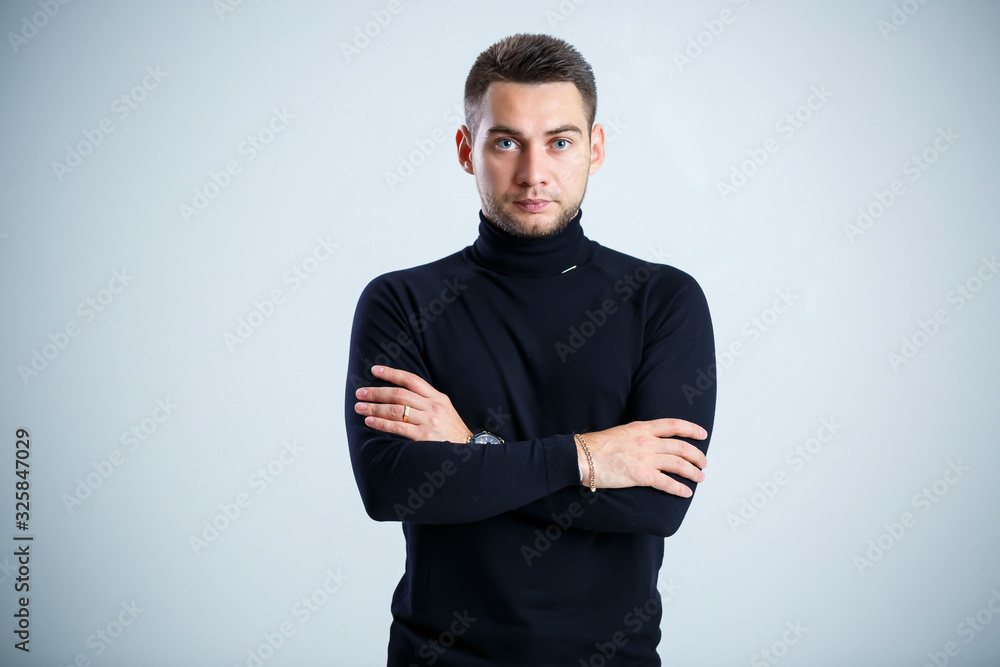 young businessman in black golf and jeans young businessman in black golf and jeans