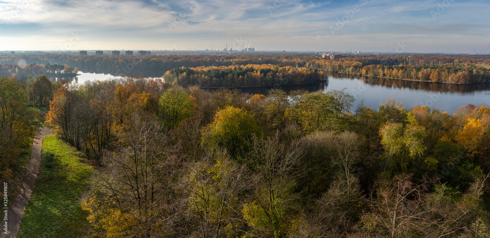 Colorful autumn trees in the Sechs-Seenplatte recreation area in Duisburg, North Rhine-Westphalia, Germany Colorful autumn trees in the Sechs-Seenplatte recreation area in Duisburg, North Rhine-Westphalia, Germany