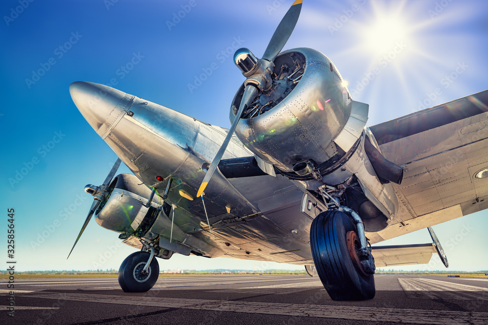 Fototapeta premium historical aircraft on a runway
