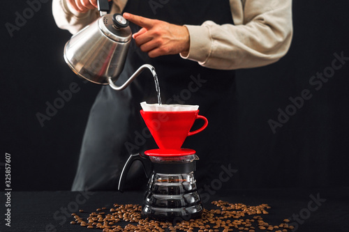 Making pour-over coffee with a hario V60 dripper photo