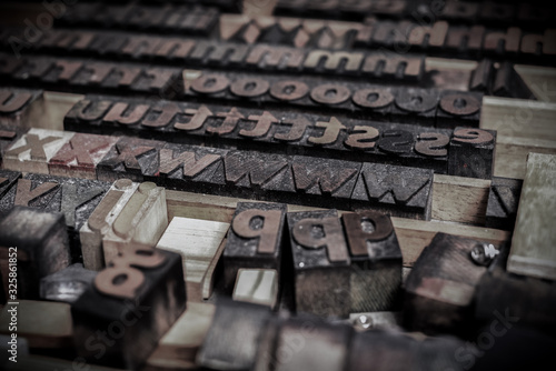 wooden letters blocks from old letterpress alphabet used for typesetting
