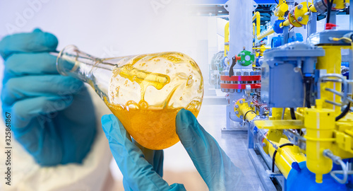 Lab technician's hands with...