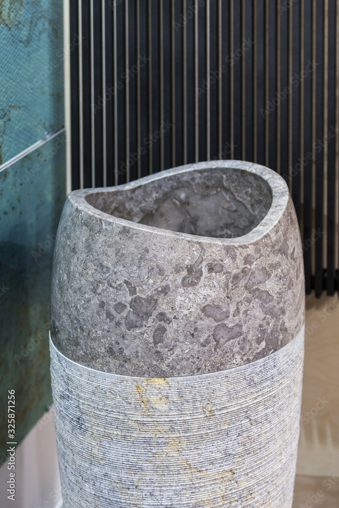Sink, washbasin made of stone, freestanding in the form of a vase of modern design