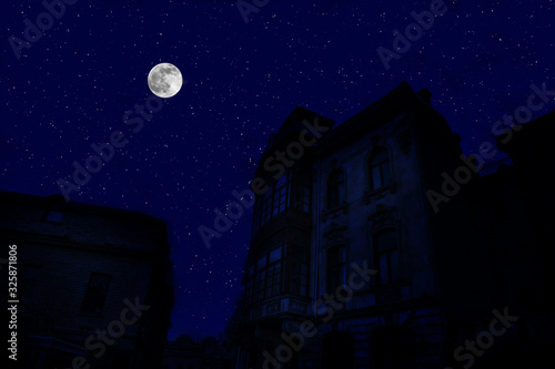 Full moon over the city at night  Baku Azerbaijan. Big full moon shining