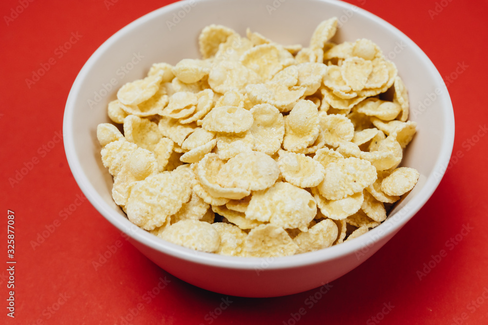 Closeup of a bowl with corn flakes Closeup of a bowl with corn flakes