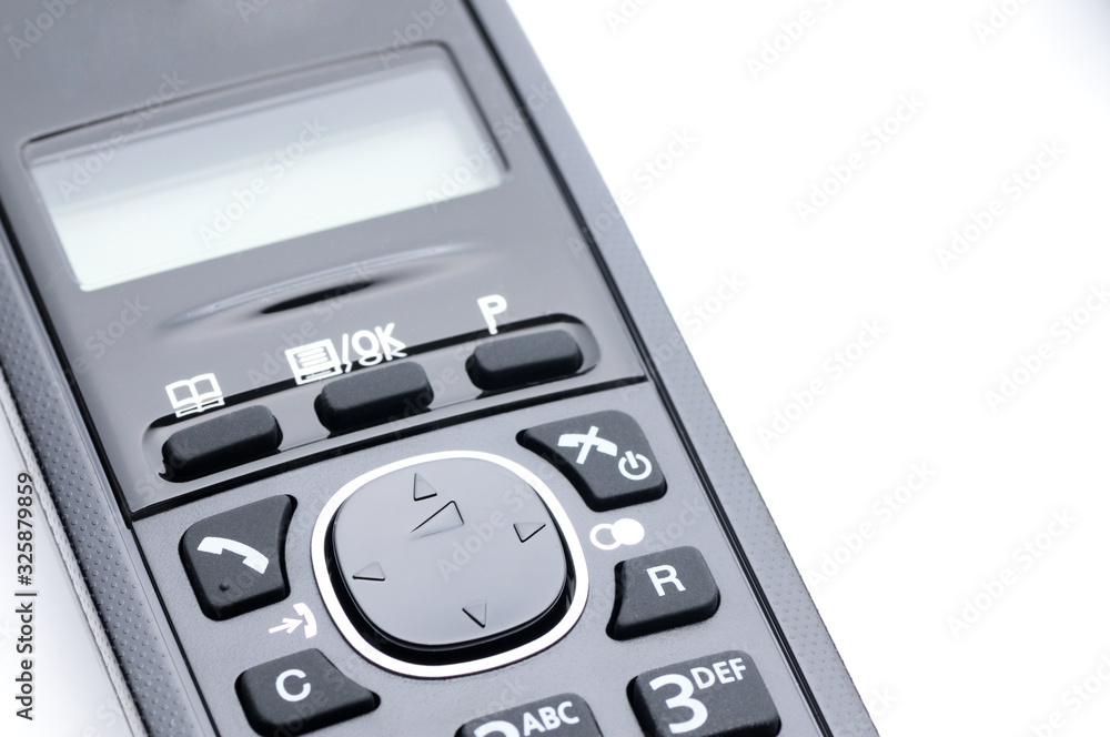 Telephone for calls to urban and long-distance lines on a white background Telephone for calls to urban and long-distance lines on a white background