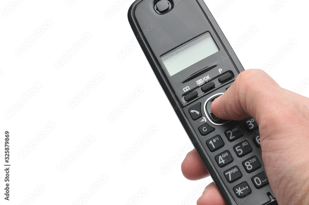Telephone for calls to urban and long-distance lines on a white background Telephone for calls to urban and long-distance lines on a white background