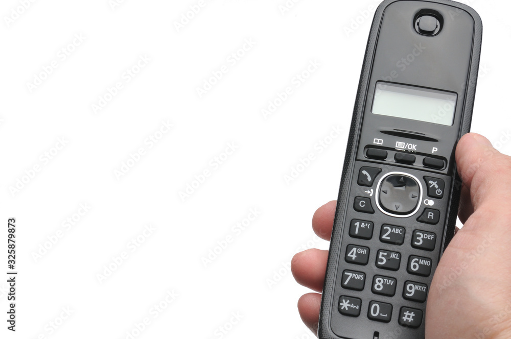 Telephone for calls to urban and long-distance lines on a white background Telephone for calls to urban and long-distance lines on a white background