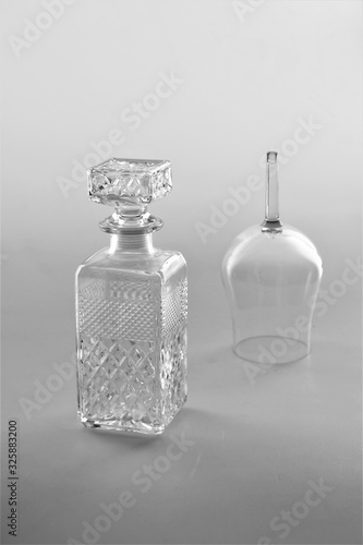 Clear bottle and clear glass - isolated