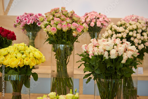 Blooming flowers in glass vase 