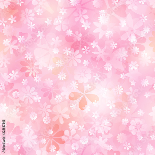 Spring seamless pattern of various flowers in pink and peach colors