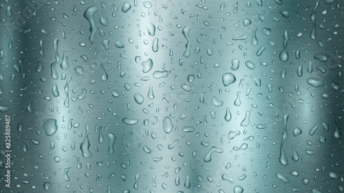 Background with drops and streaks of water in light blue colors, flowing down the metal surface