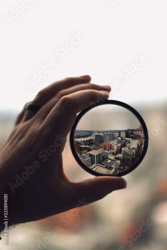 Holding Cityscape through lens