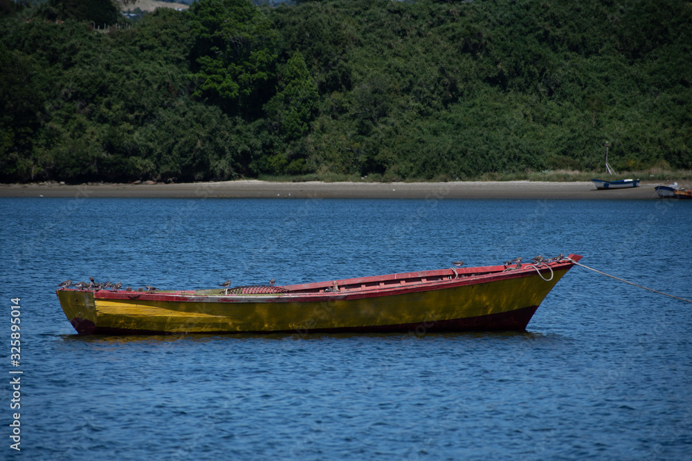 Wooden typical fishing boat at Chiloe, Chile