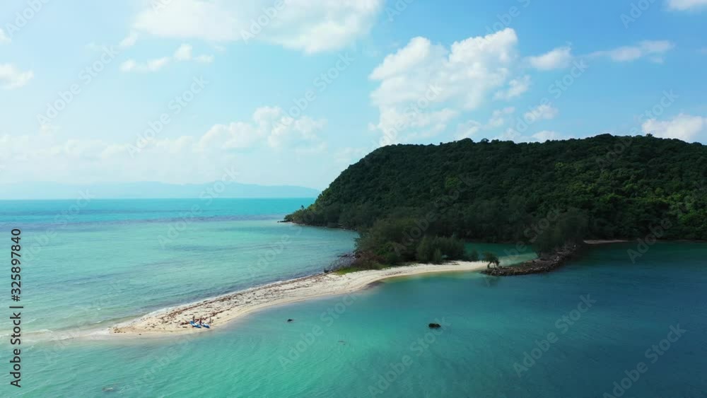 Aerial view of small uninhabited cay with preserved natural exotic forest on sunny summer day. Tropical landscape, Thailand Aerial view of small uninhabited cay with preserved natural exotic forest on sunny summer day. Tropical landscape, Thailand