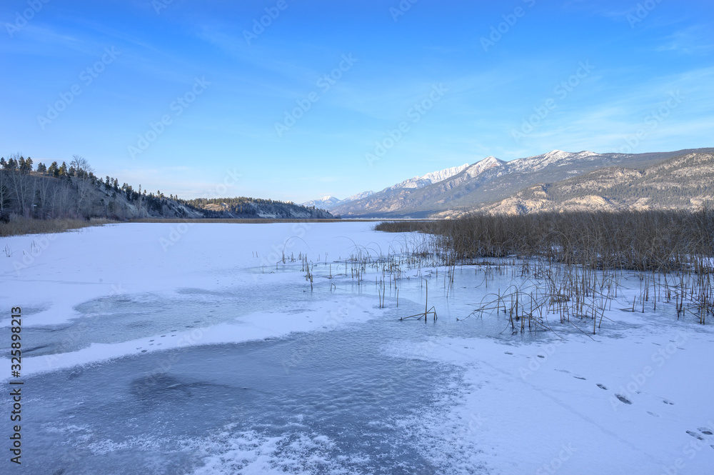 Winter view of Columbia Lake, headwater of the Columbia River, at Canal Flats, British Columbia, Canada