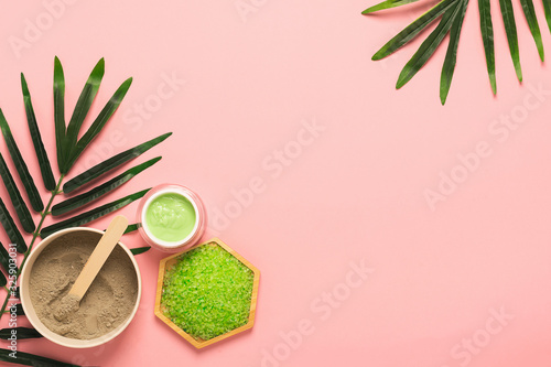 Various natural remedies clay salt body care cream home pink background. Spa treatments concept of health and beauty.