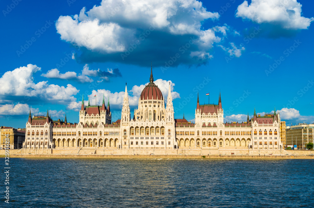 Budapest, Hungary - CIRCA 2013: Hungarian Parliament Building, as photographed from across the Danube; at a bright sunny summer day.