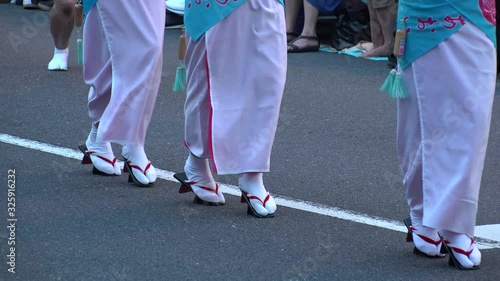 KOENJI, TOKYO, JAPAN - 25 AUGUST 2019 : Scenery of AWA ODORI FESTIVAL. It is a traditional dance festival of Tokushima prefecture. Famous annual Japanese summer event. photo