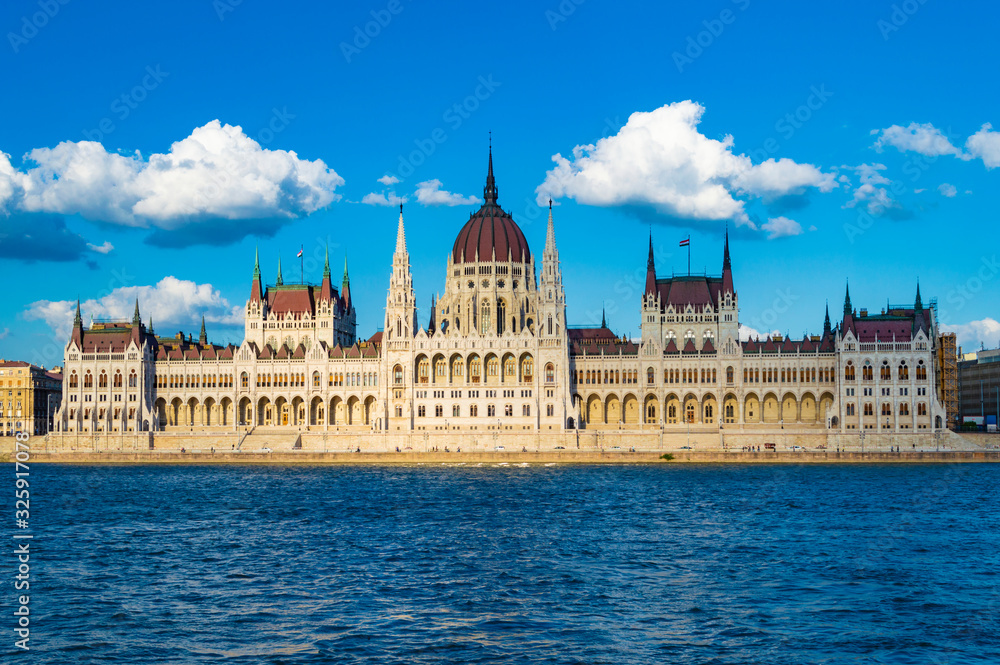 Budapest, Hungary - CIRCA 2013: Hungarian Parliament Building, as photographed from across the Danube; at a bright sunny summer day.