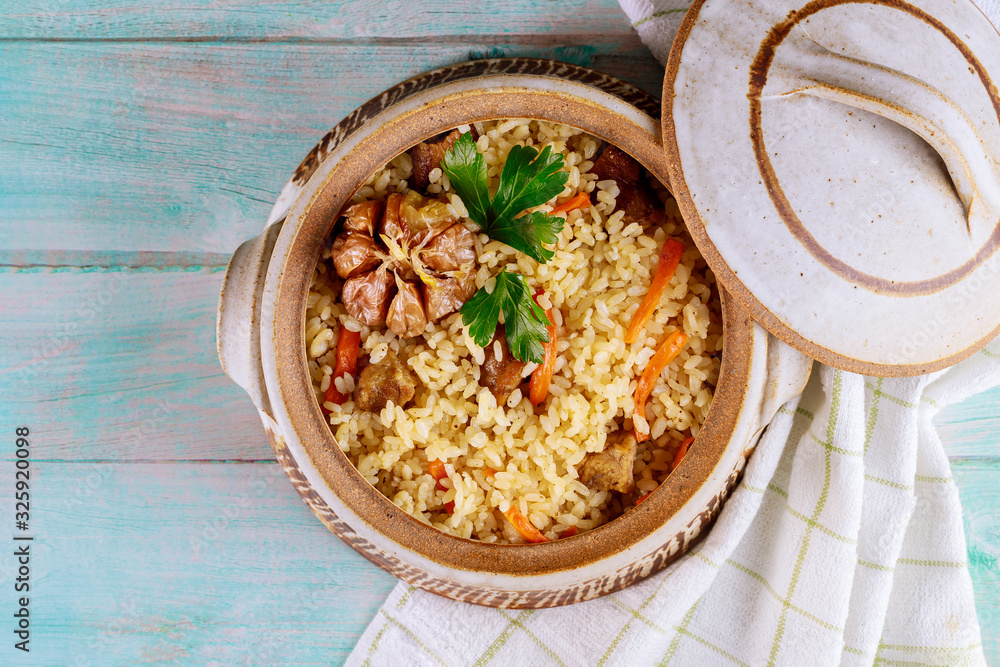 Rice pilaf with lamb, carrots, garlic and indian spices. Rice pilaf with lamb, carrots, garlic and indian spices.