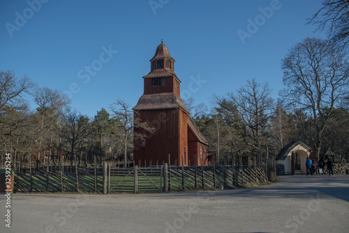 The church Seglora kyrka from 1700s in a park in Stockholm a sunny winter day. photo