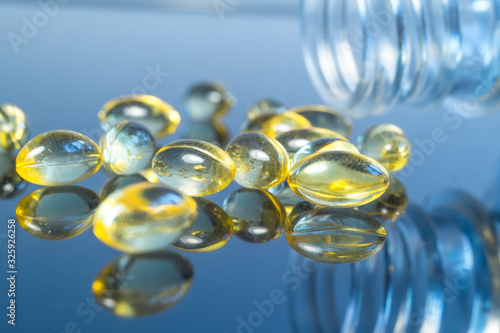 Fish oil capsules in a glass bottle