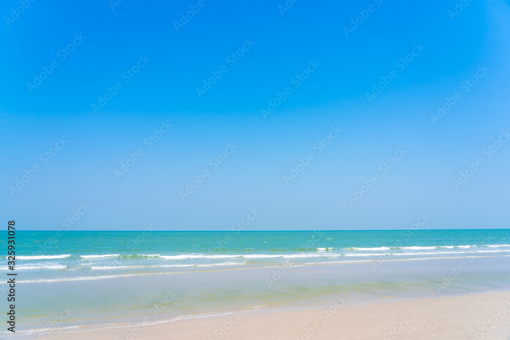 Beautiful tropical nature of beach sea ocean with blue sky